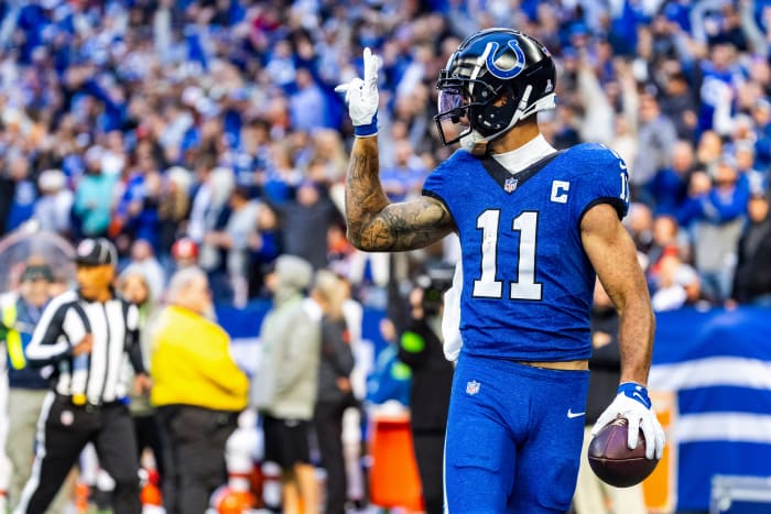 Oct 22, 2023; Indianapolis, Indiana, USA; Indianapolis Colts wide receiver Michael Pittman Jr. (11) celebrates his rushing touchdown in the second half against the Cleveland Browns at Lucas Oil Stadium. Mandatory Credit: Trevor Ruszkowski-USA TODAY Sports